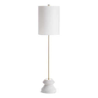 Tall table lamp with washed white wood base and gold iron lamp rod
