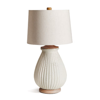 Table lamp with textured carved detailed base and wood finishes